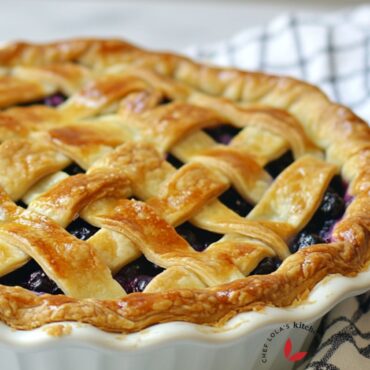 Homemade blueberry pie with a flaky crust and sweet filling